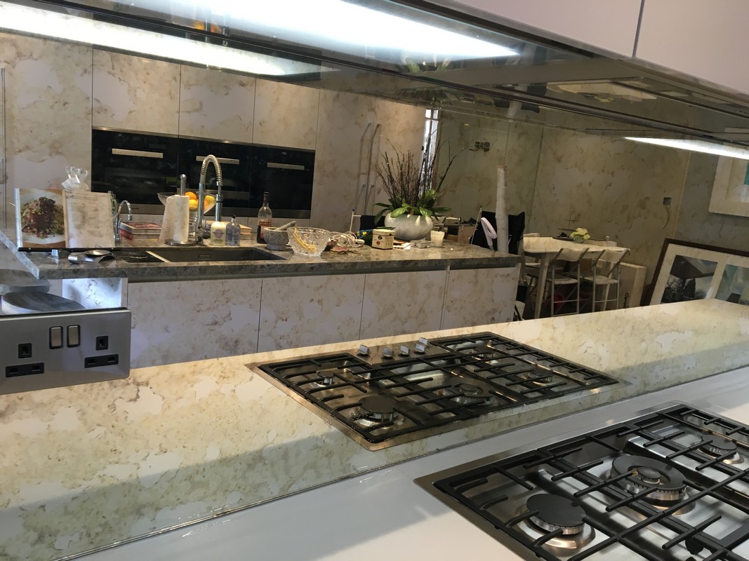 Mirror glass splashback in West Ealing luxury kitchen